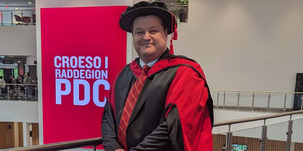 Marshall COO Gareth Williams receives honorary doctorate from University of South Wales